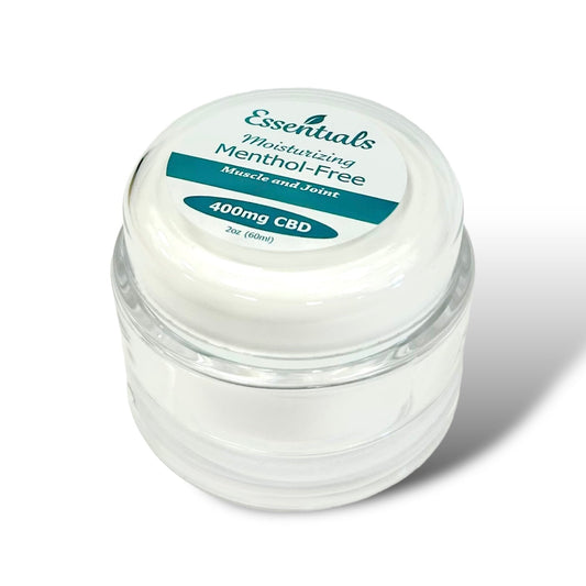 Clear jar with white lid labeled 'Essentials' on a white background